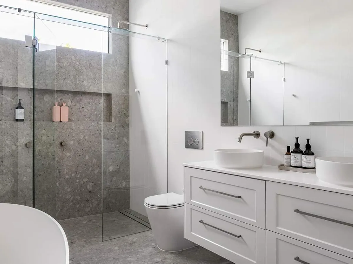 Clyde Street bathroom with stone tiles and freestanding bath