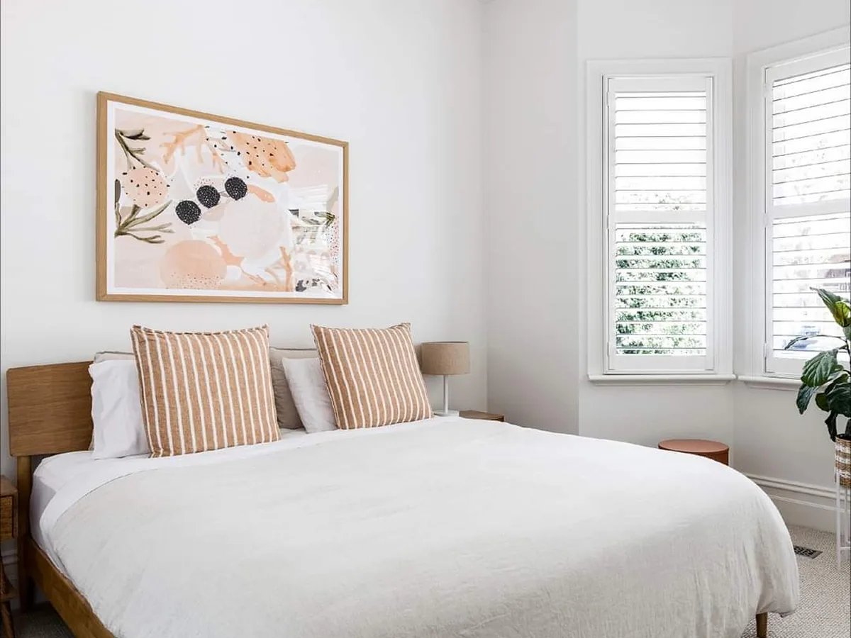 Clyde Street master bedroom with bay window and plantation shutters