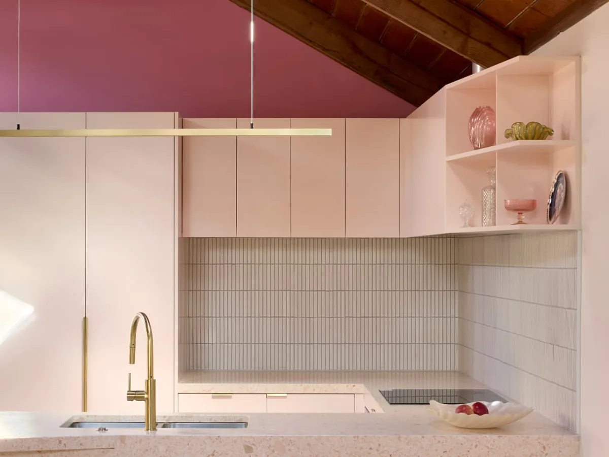 Finsbury Street kitchen with pink terrazzo island and finger tile splashback