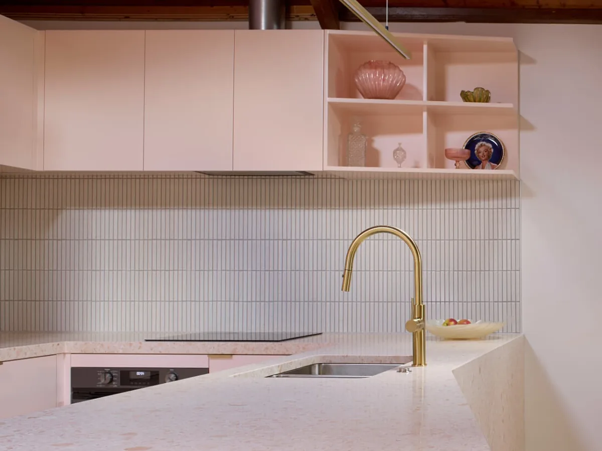 Finsbury Street curved terrazzo island bench with brass tapware