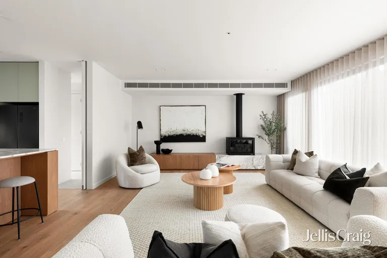 Glen Iris open living room with wood fireplace