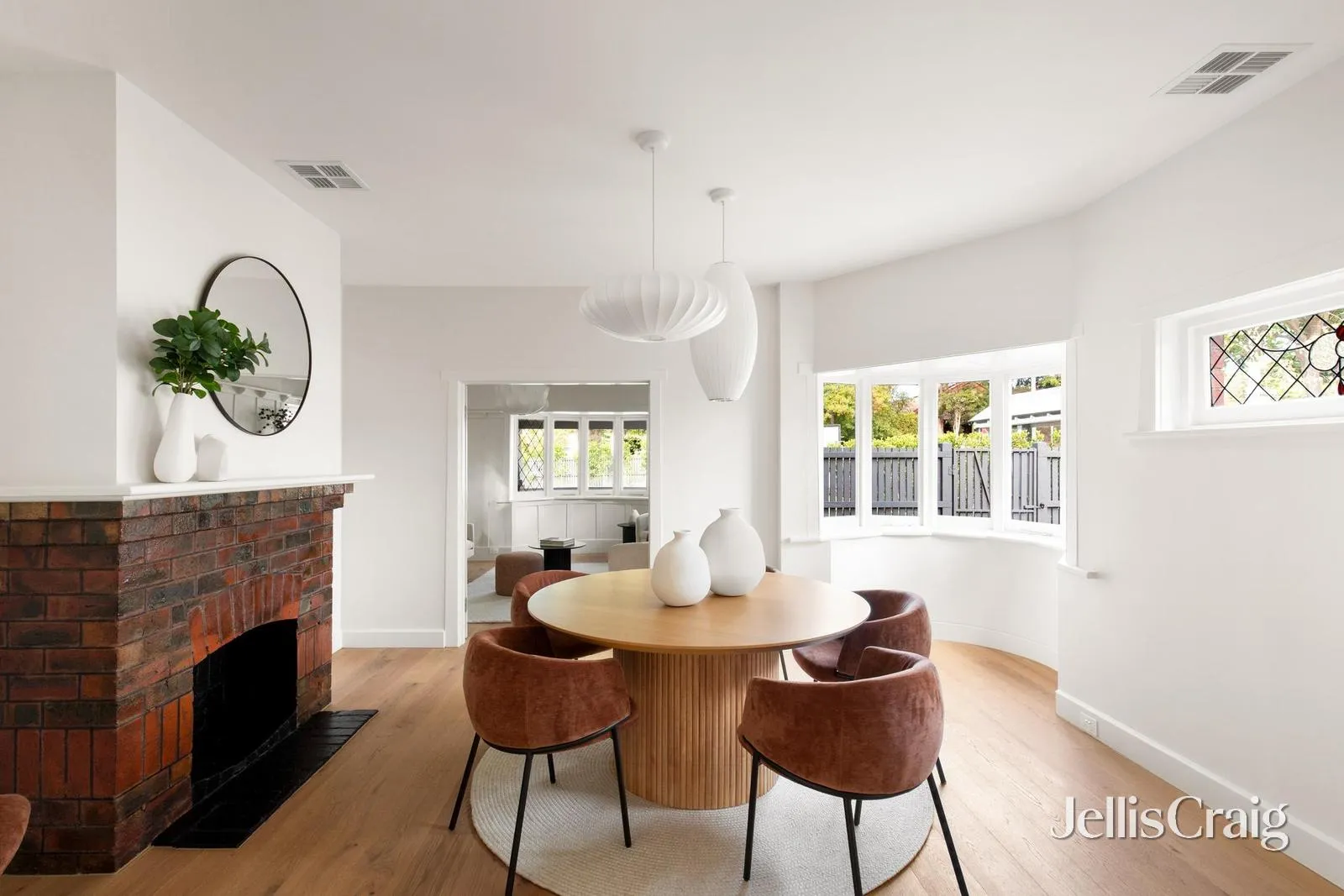 Glen Iris dining area with restored brick fireplace