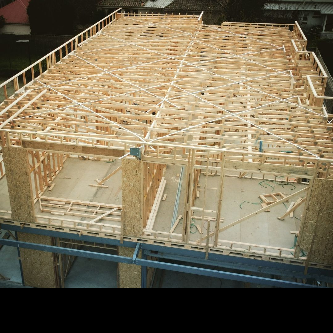 Interior construction detail showing open framing by JSG Construct.